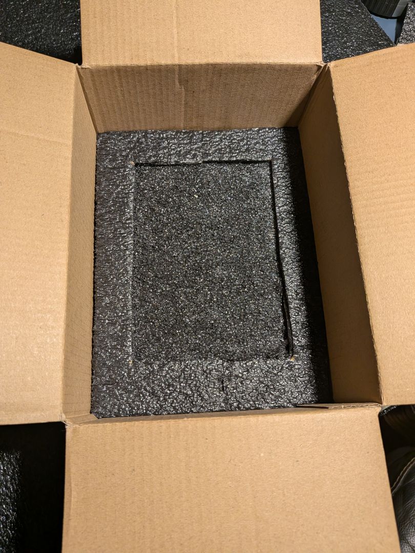 Shipping box lined with a fitted PE foam base